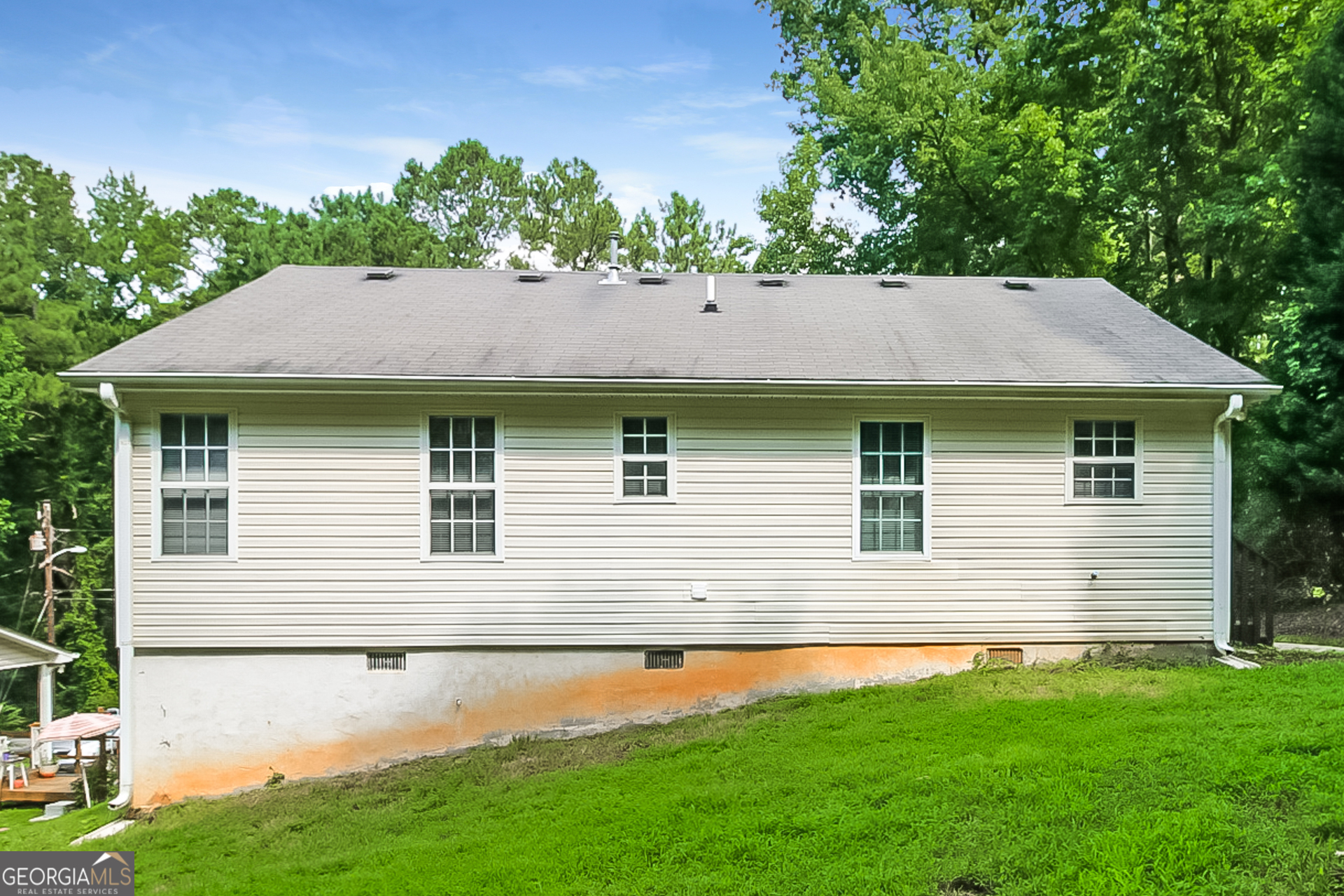 8303 Lakeview Drive Southwest Covington, GA 30014 - Photo 15 of 16 a front view of a house with a yard