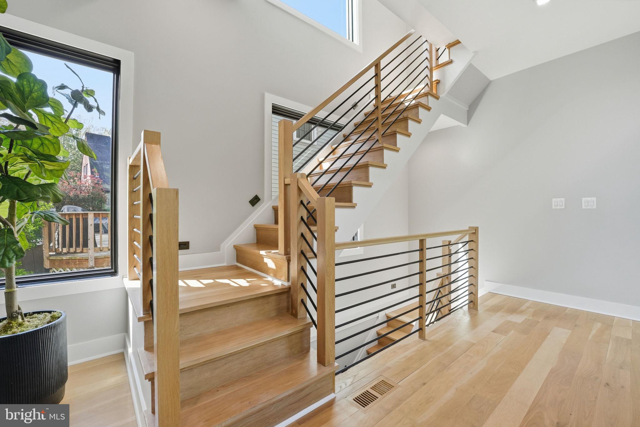 2211 Military Road Arlington, VA 22207 - Photo 14 of 107 Elegant staircase with natural light.