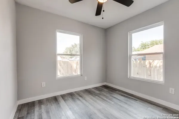 a view of an empty room and window
