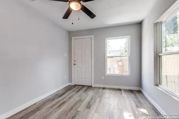 an empty room with windows
