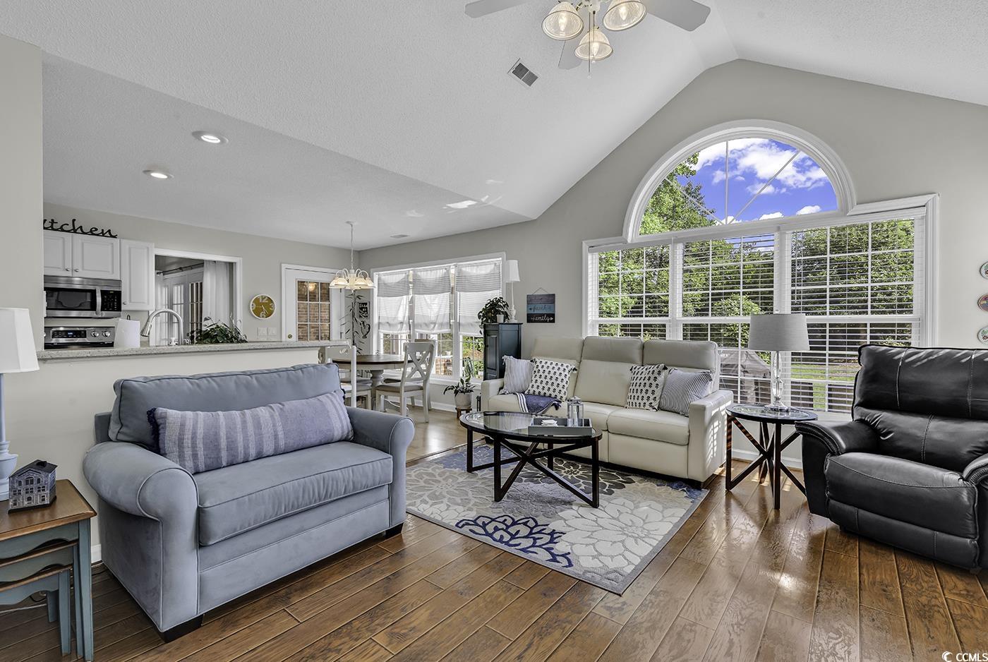 86 Black River Road Myrtle Beach, SC 29588 - Photo 14 of 40 Living area with ceiling fan, wood-style flooring, high vaulted ceiling, and recessed lighting