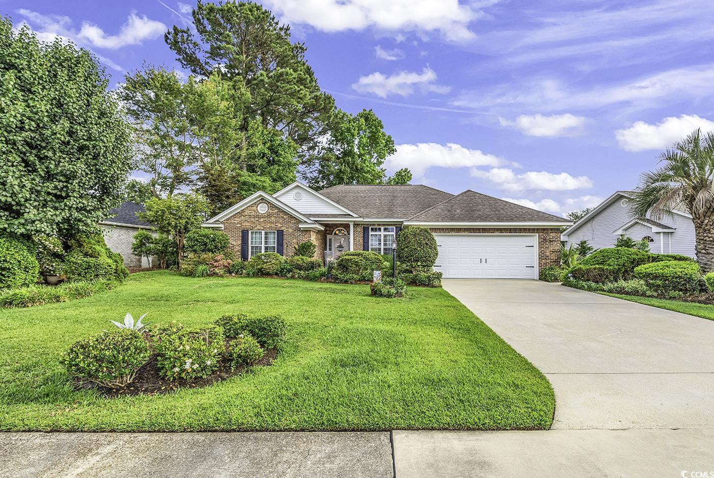 86 Black River Road Myrtle Beach, SC 29588 - Photo 2 of 40 Single story home, all brick siding, a front yard, and 2 car garage,