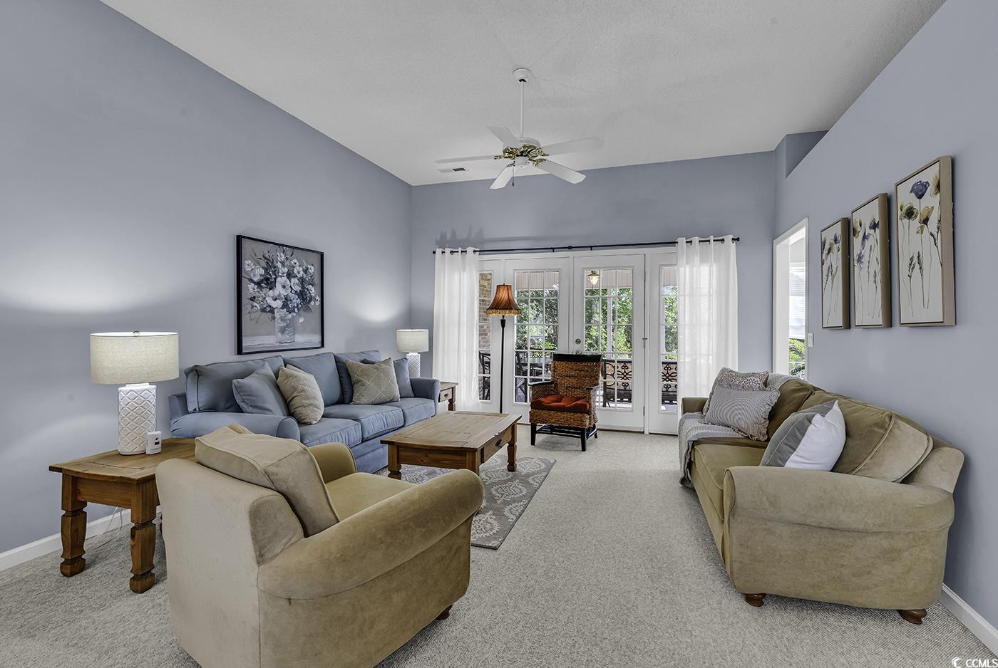 86 Black River Road Myrtle Beach, SC 29588 - Photo 4 of 40 Living area, light colored carpet, baseboards, and ceiling fan