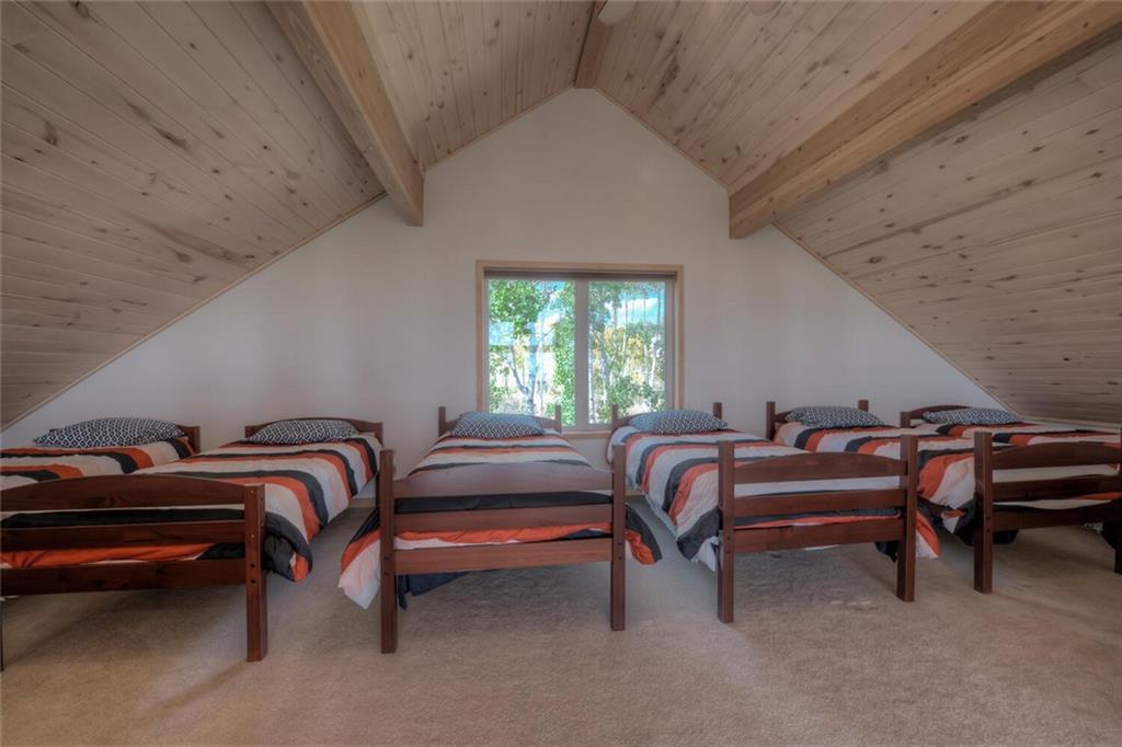 3207 High Creek Road Fairplay, CO 80440 - Photo 20 of 35 a bedroom with furniture and a window