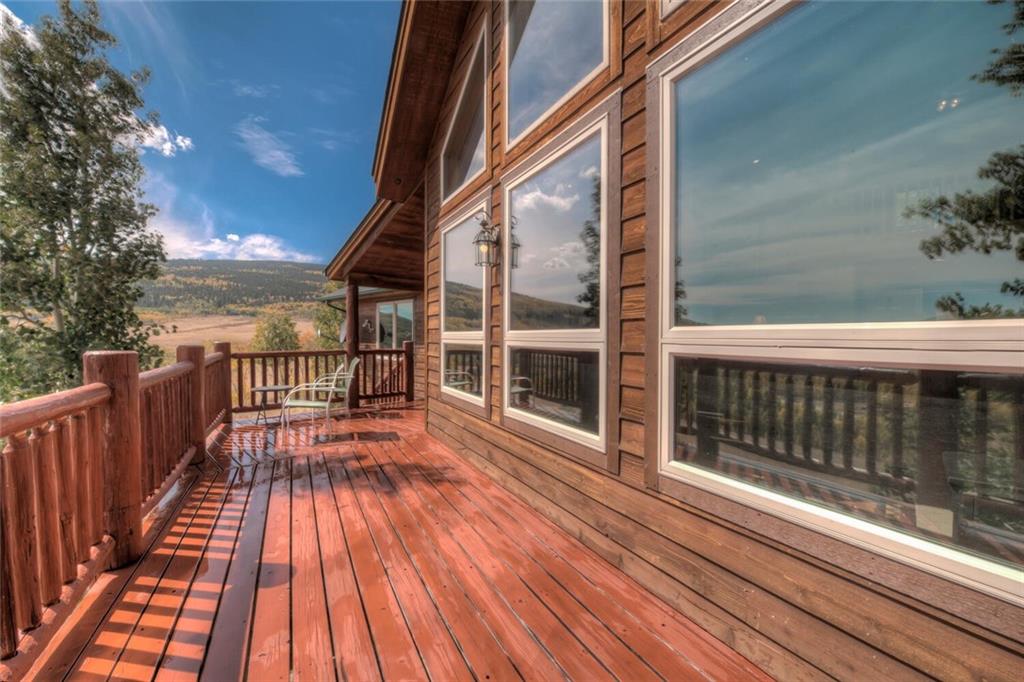 3207 High Creek Road Fairplay, CO 80440 - Photo 6 of 35 a view of a balcony with wooden floor and fence