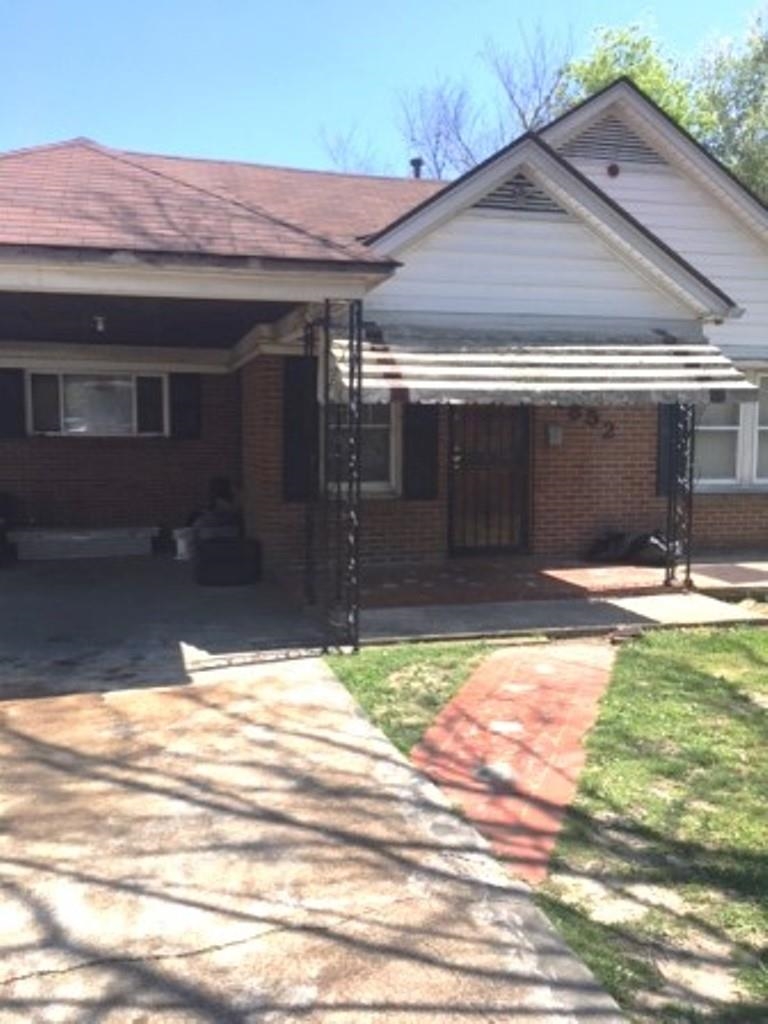 1852 Swift Street Memphis, TN 38109 - Photo 1 of 8 a view of backyard of the house