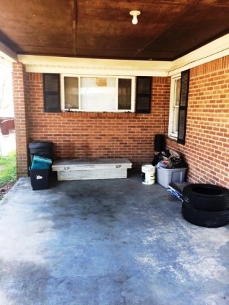 1852 Swift Street Memphis, TN 38109 - Photo 4 of 8 a view of couches in front of a house