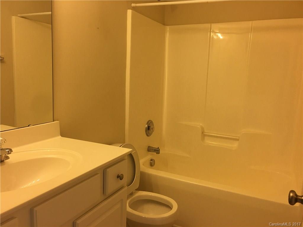 976 Copperstone Lane Fort Mill, SC 29708 - Photo 14 of 20 a bathroom with a sink a toilet and shower