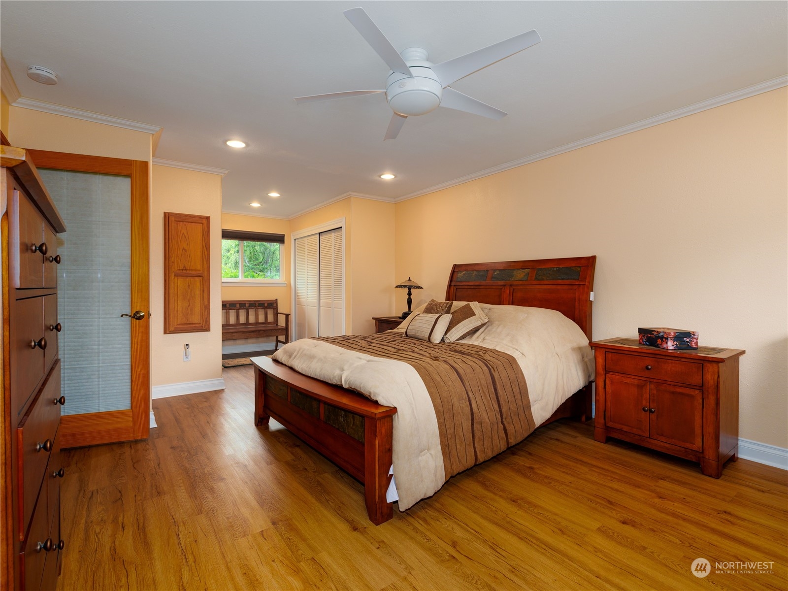 269 Curtis Hill Road Chehalis, WA 98532 - Photo 11 of 38 a bedroom with a bed and wooden floor