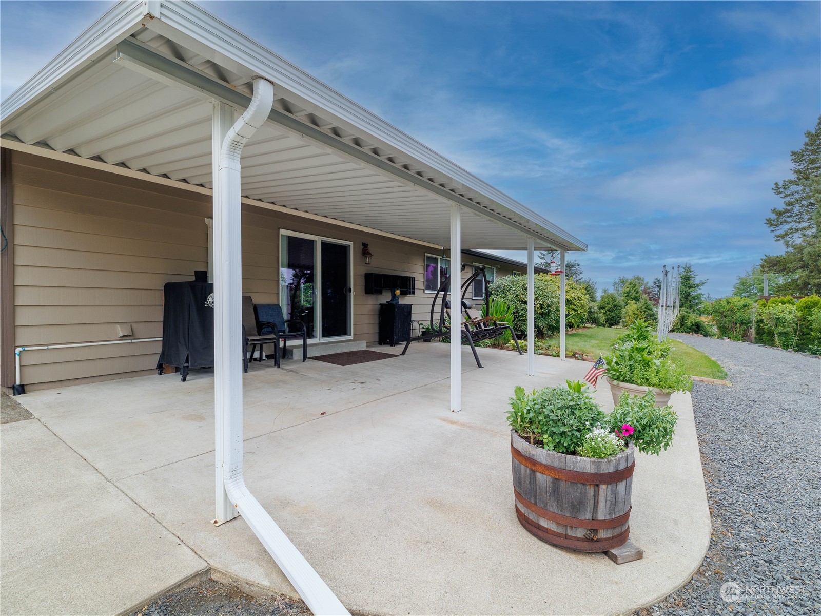 269 Curtis Hill Road Chehalis, WA 98532 - Photo 23 of 38 a view of a patio with chair and potted plants