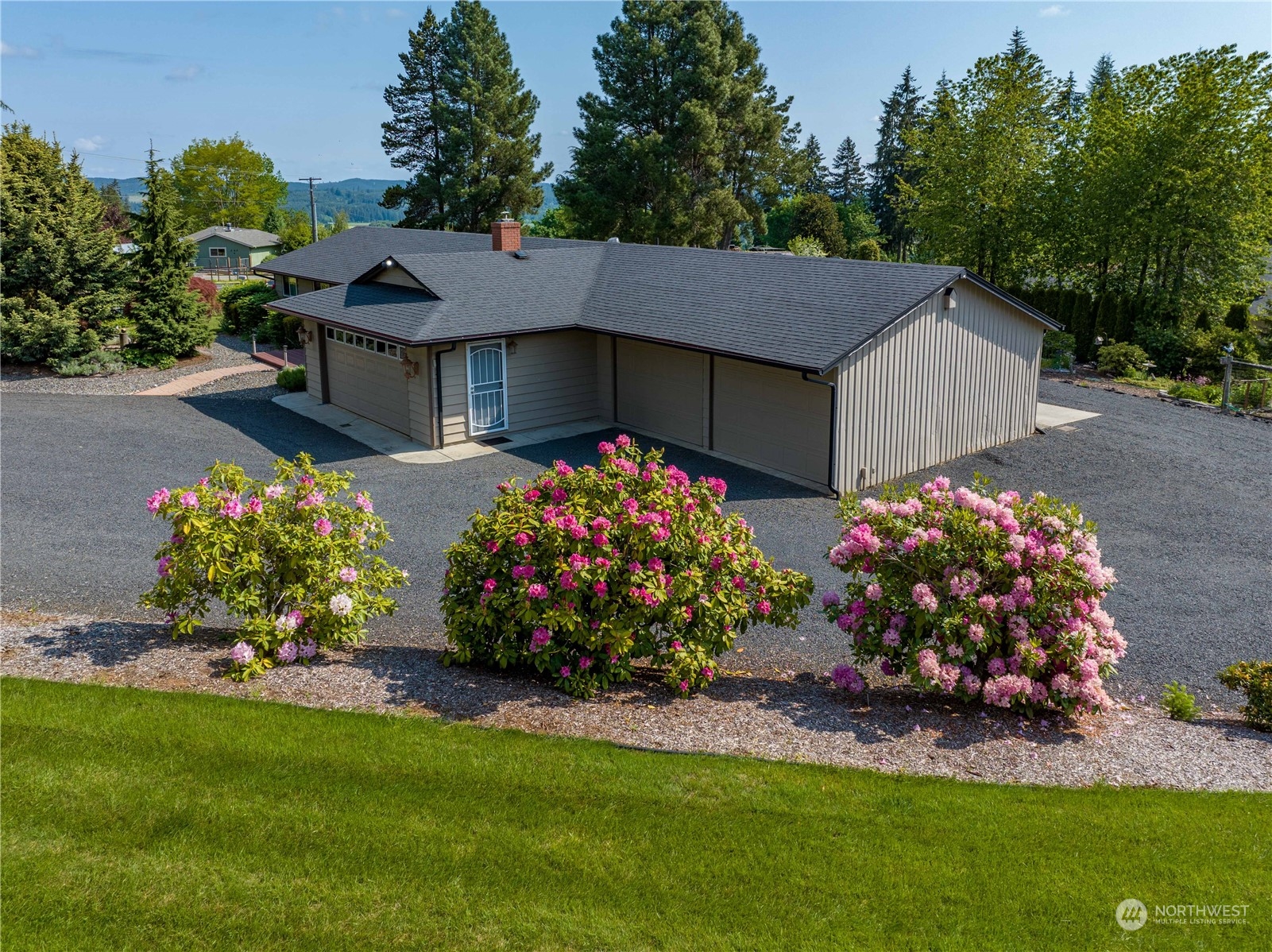 269 Curtis Hill Road Chehalis, WA 98532 - Photo 29 of 38 a front view of a house with a yard and garage