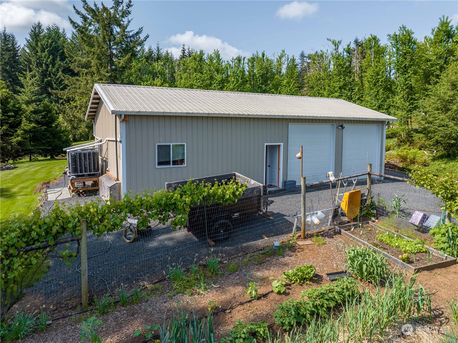269 Curtis Hill Road Chehalis, WA 98532 - Photo 30 of 38 a backyard of a house with yard and outdoor seating