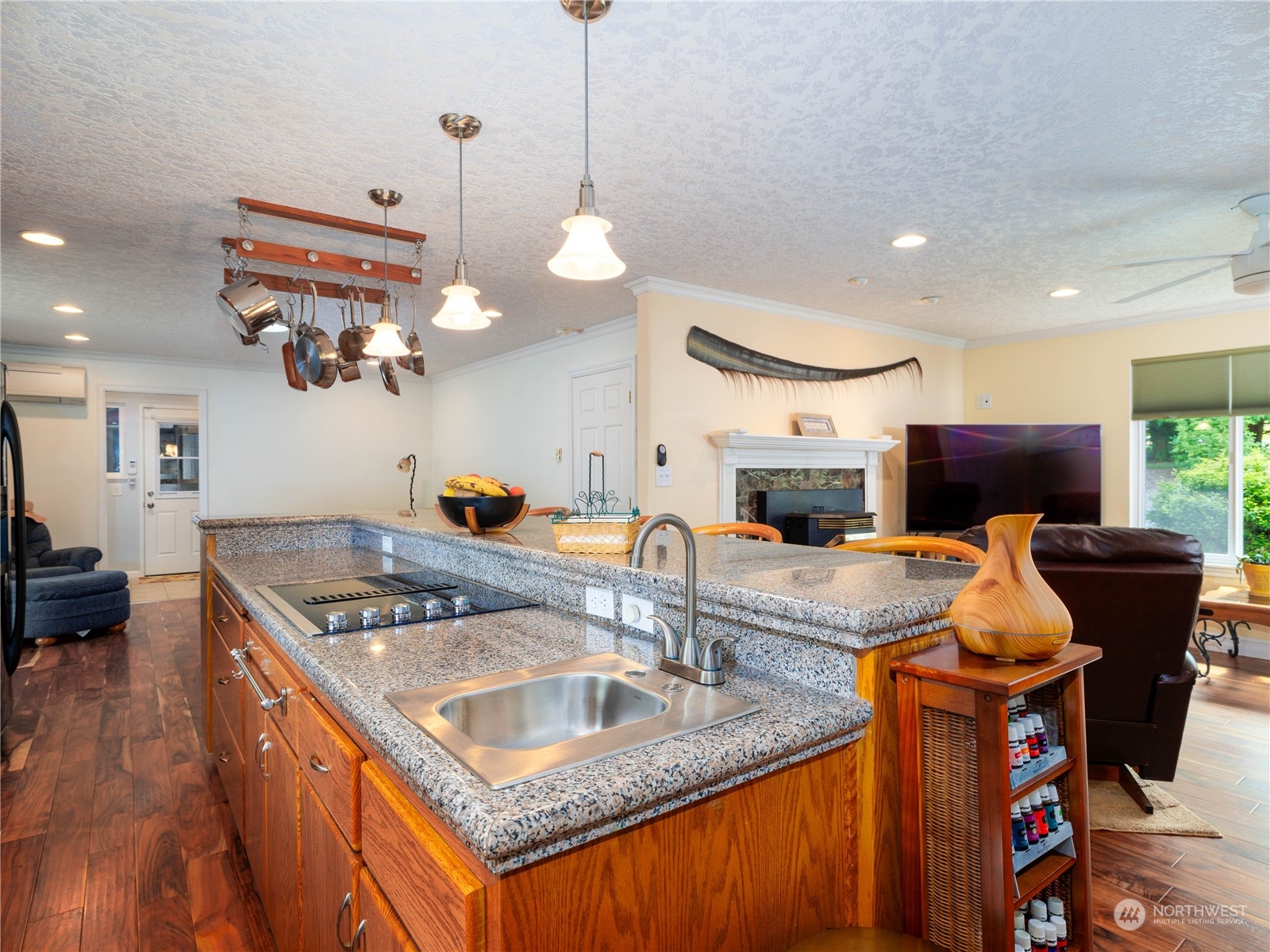 269 Curtis Hill Road Chehalis, WA 98532 - Photo 8 of 38 a kitchen with stainless steel appliances granite countertop a sink a stove and a wooden floors