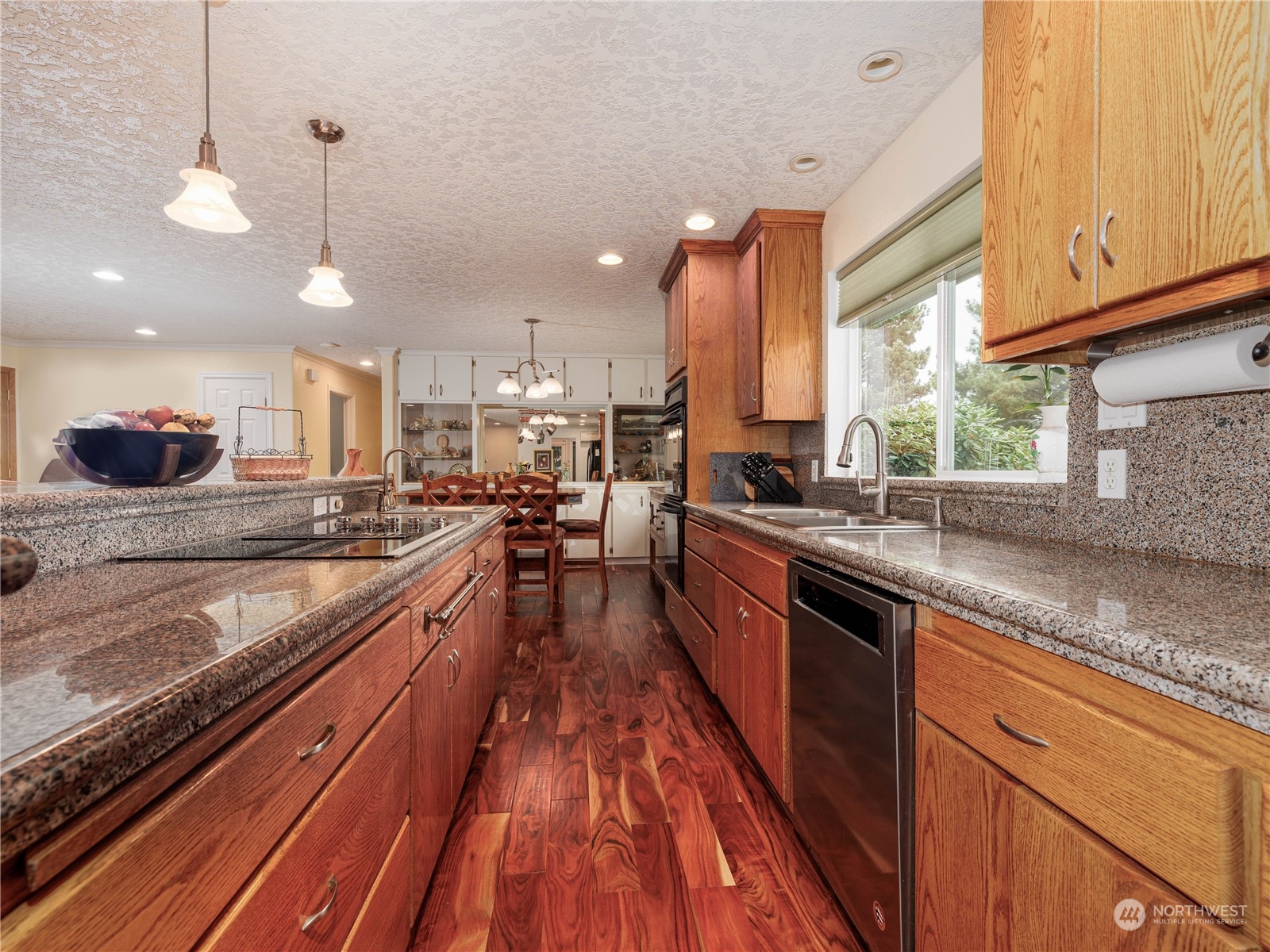269 Curtis Hill Road Chehalis, WA 98532 - Photo 10 of 38 a large kitchen with stainless steel appliances lots of counter space and a sink