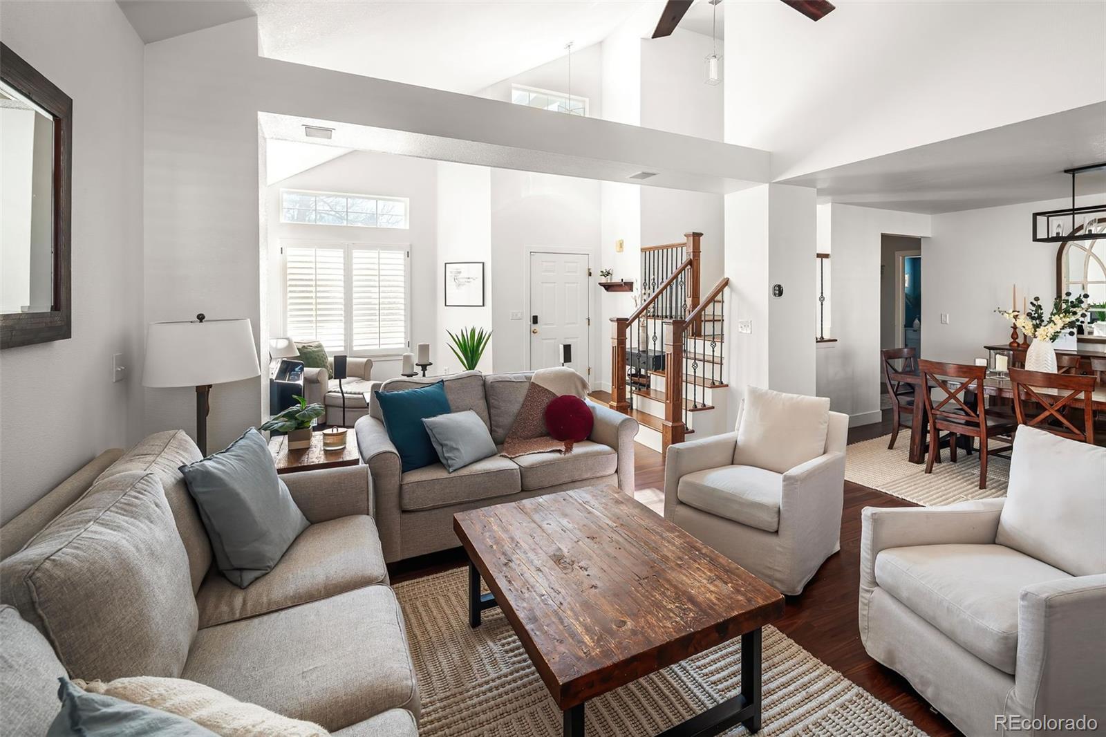 7255 West 97th Place Broomfield, CO 80021 - Photo 14 of 47 a living room with furniture and a large window
