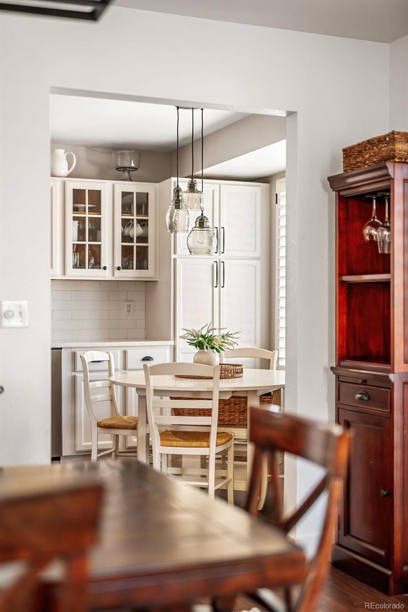 7255 West 97th Place Broomfield, CO 80021 - Photo 18 of 47 a living room with fireplace furniture and a window