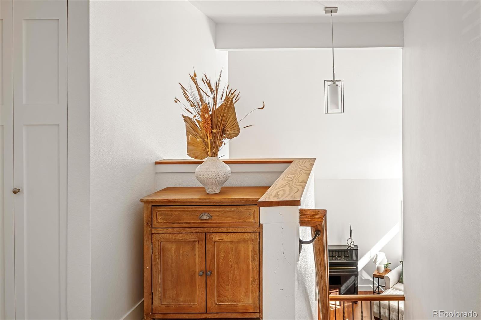 7255 West 97th Place Broomfield, CO 80021 - Photo 25 of 47 a view of hallway with washer and dryer