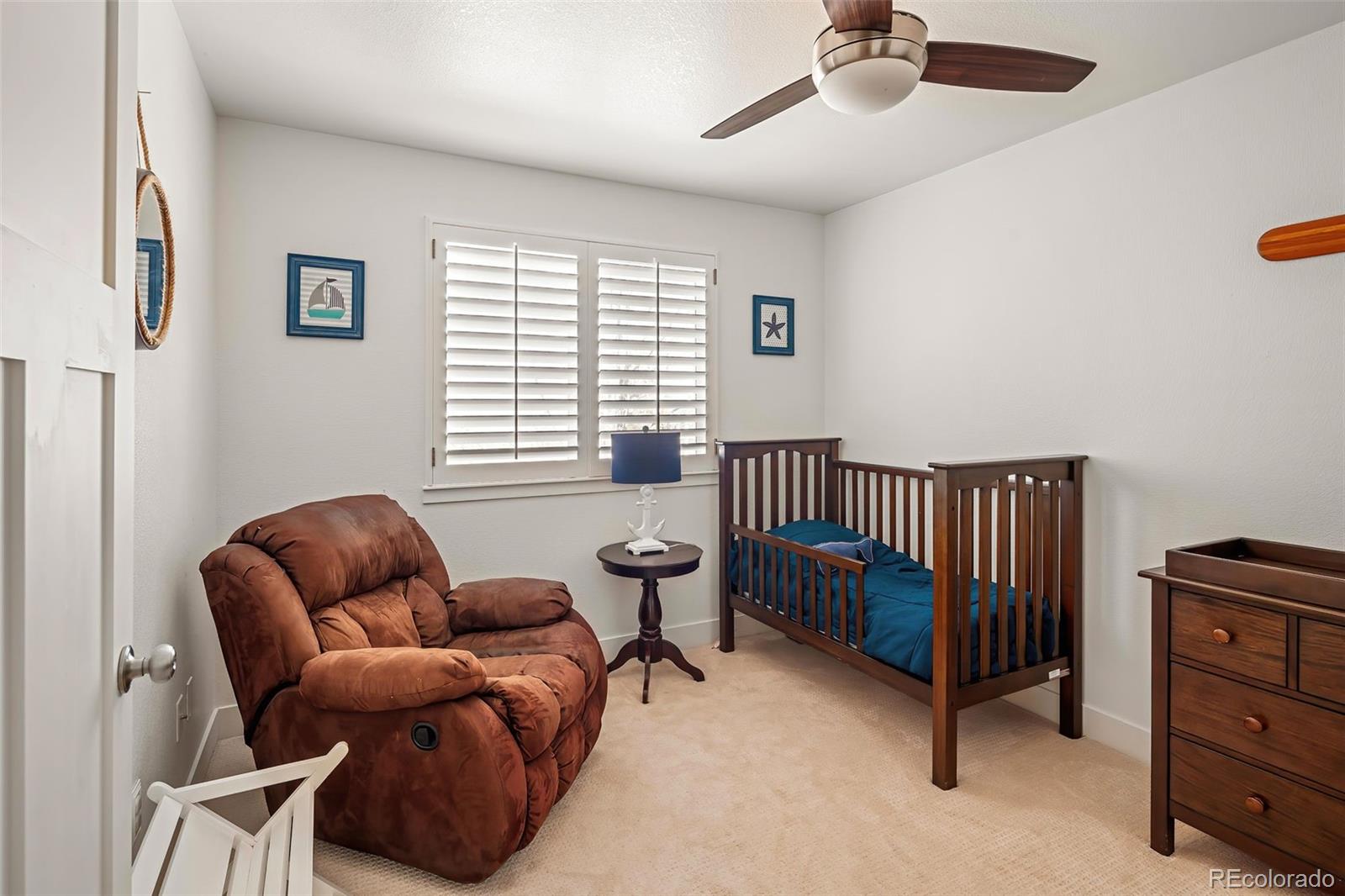 7255 West 97th Place Broomfield, CO 80021 - Photo 32 of 47 a living room with furniture and a window