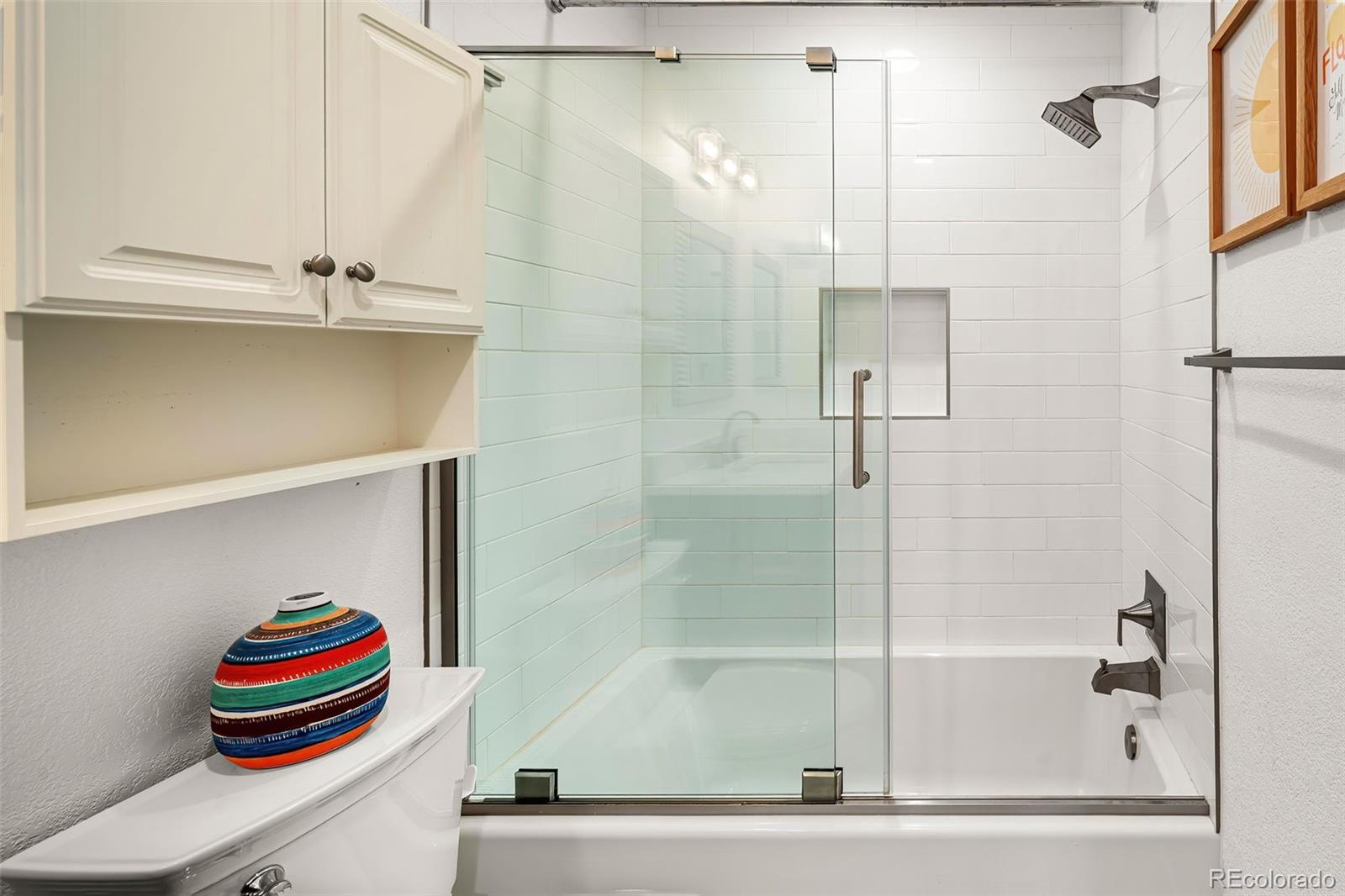 7255 West 97th Place Broomfield, CO 80021 - Photo 35 of 47 a bathroom with a bathtub and a shower