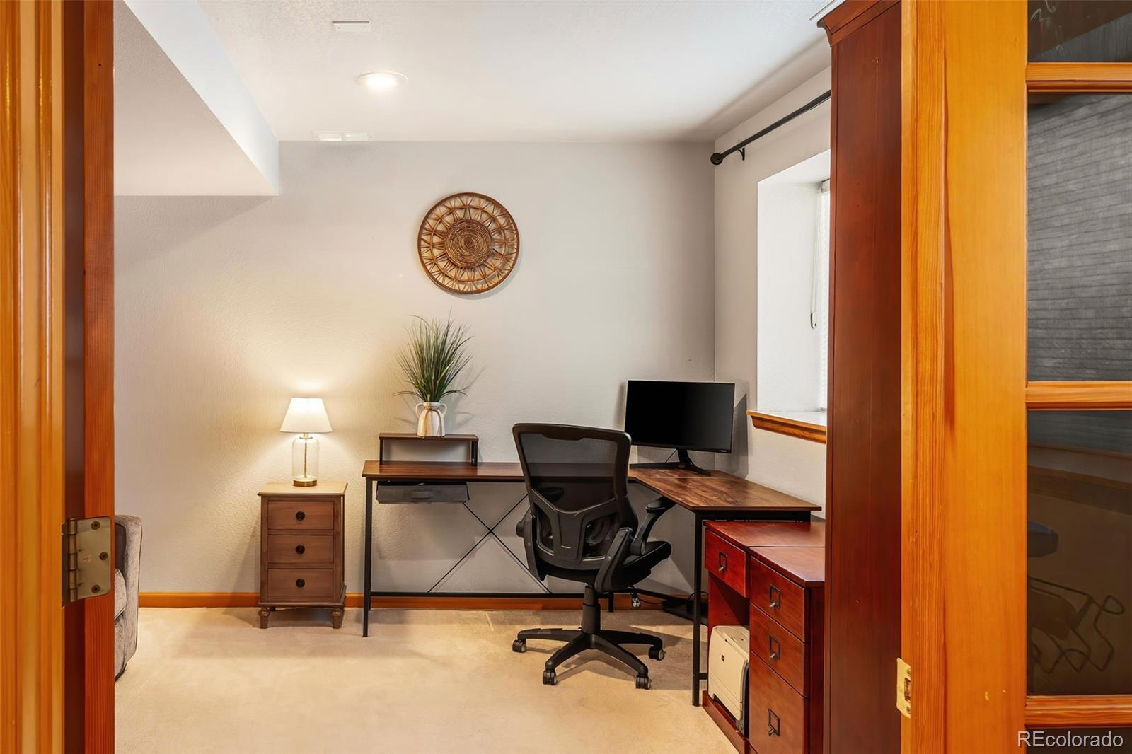 7255 West 97th Place Broomfield, CO 80021 - Photo 38 of 47 a view of a workspace with a window