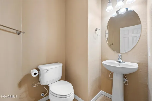 a view of a room with windows and stairs