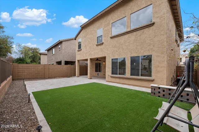 a view of a garden from a corridor