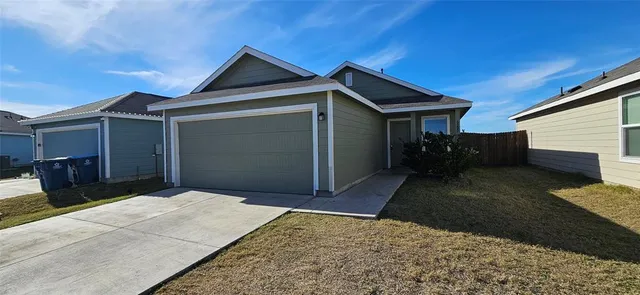 a front view of house with yard