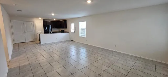 a view of kitchen with windows