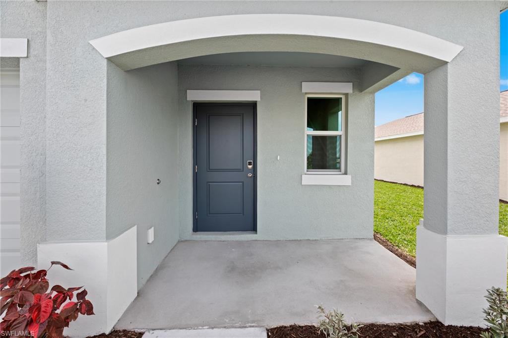 7182 Sugar Pine Way Fort Myers, FL 33966 - Photo 2 of 36 a view of a room that has window in it
