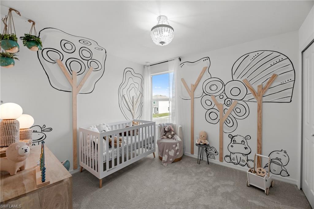 7182 Sugar Pine Way Fort Myers, FL 33966 - Photo 24 of 36 a bedroom with a bed and a window