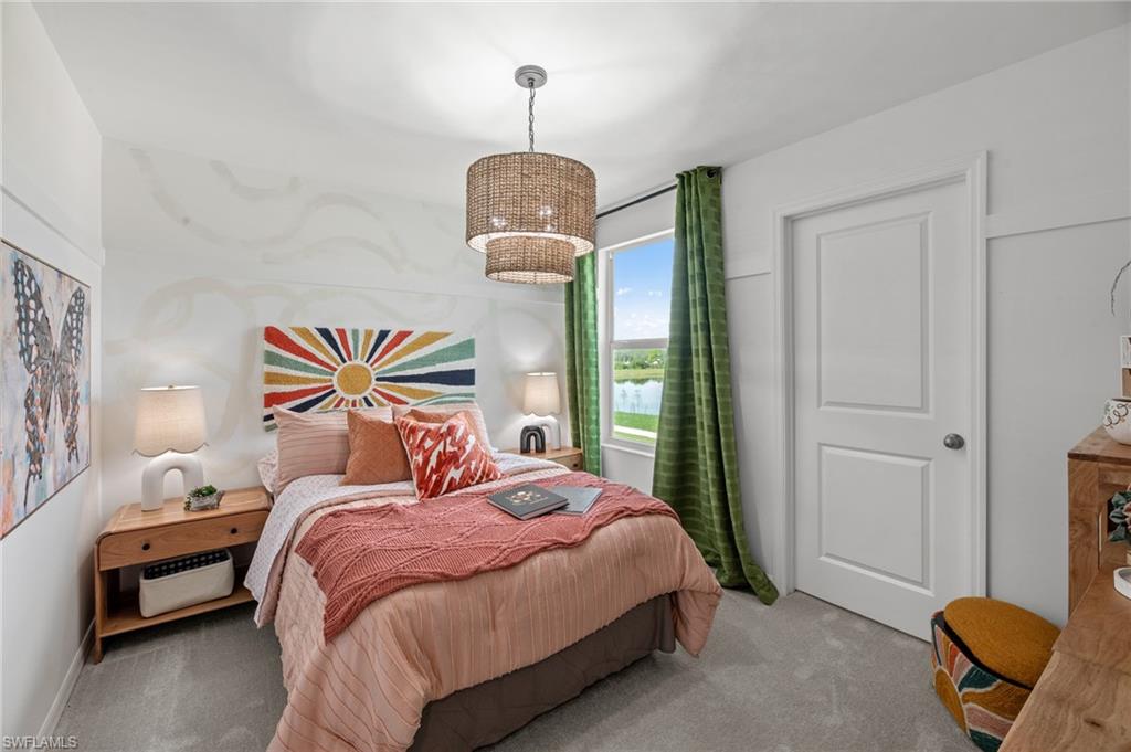 7182 Sugar Pine Way Fort Myers, FL 33966 - Photo 27 of 36 a bedroom with bed and a window