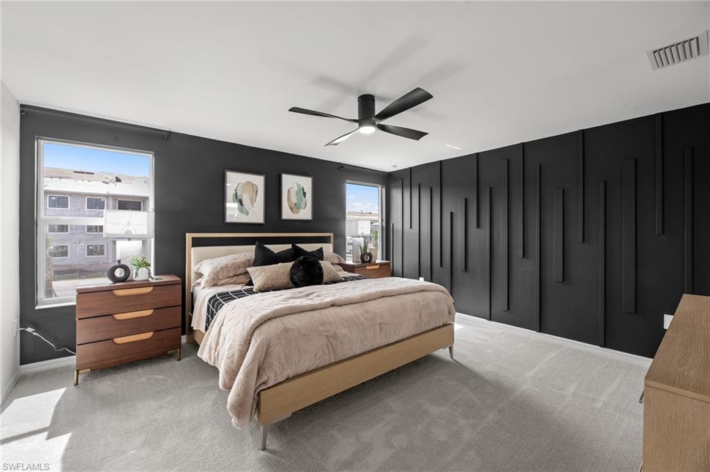 7182 Sugar Pine Way Fort Myers, FL 33966 - Photo 31 of 36 a large bedroom with bed and window