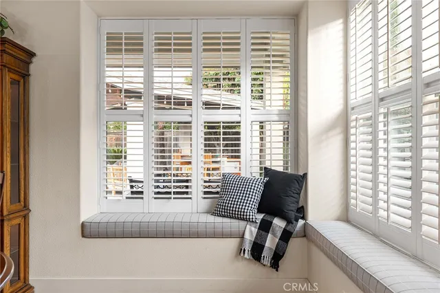 a bedroom with a bed and flat screen tv