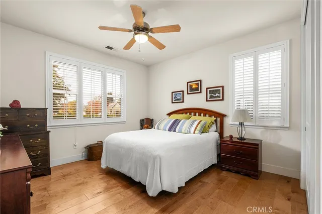 a backyard of a house with outdoor seating