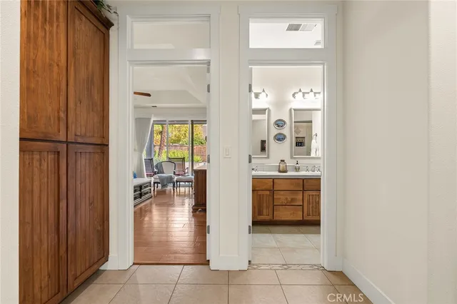 a view of a backyard with a patio and swimming pool