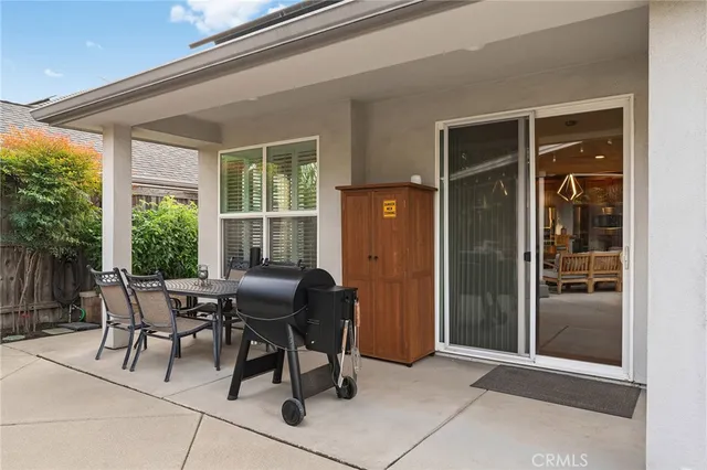 a view of a swimming pool with a patio