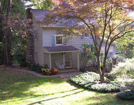 121 Compo Road South Westport, CT 06880 - Photo 1 of 1 a view of a house with backyard porch and sitting area