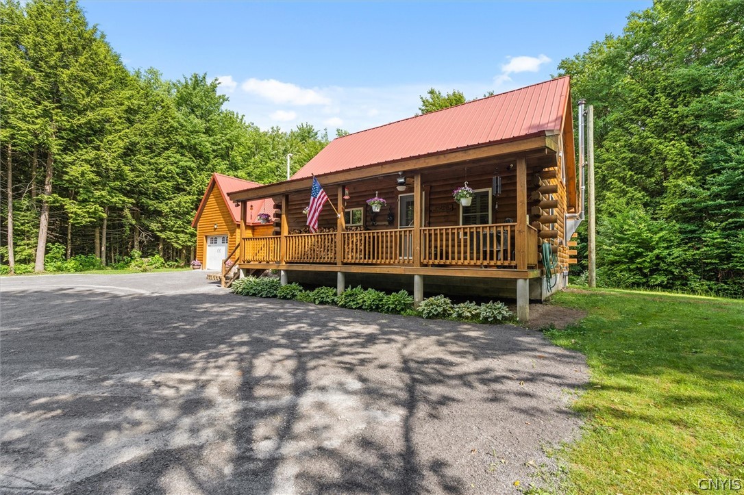 9831 Steam Mill Road Camden, NY 13316 - Photo 3 of 42 Stunning curb appeal with a picturesque country se