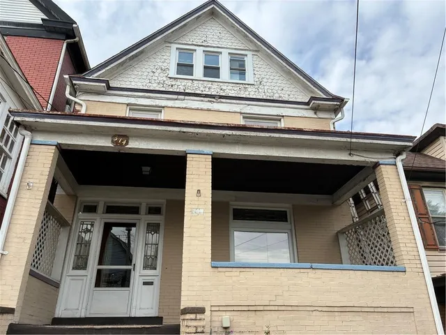 a view of a house with a balcony