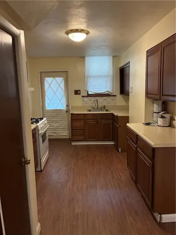 a room with a bed and a window