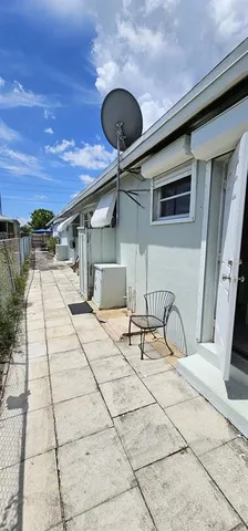 a front view of a house with patio