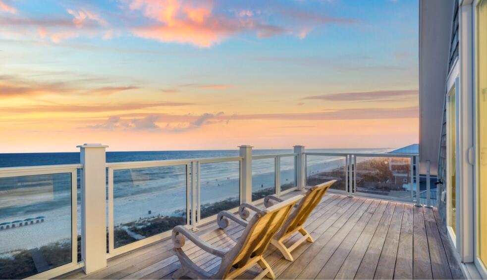 22015 Front Beach Road Panama City Beach, FL 32413 - Photo 14 of 104 a view of a balcony with chair and wooden floor