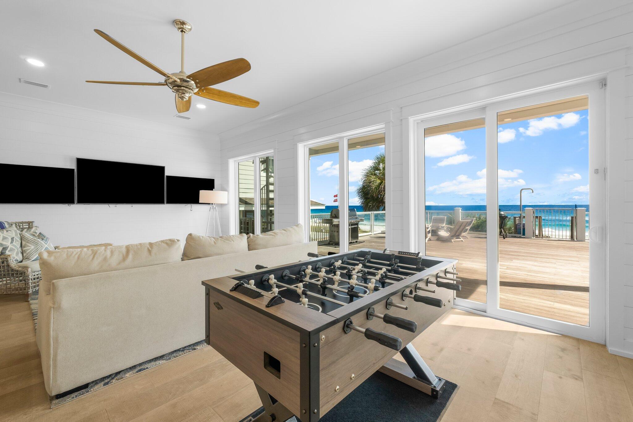 22015 Front Beach Road Panama City Beach, FL 32413 - Photo 37 of 104 a living room with furniture and a large window