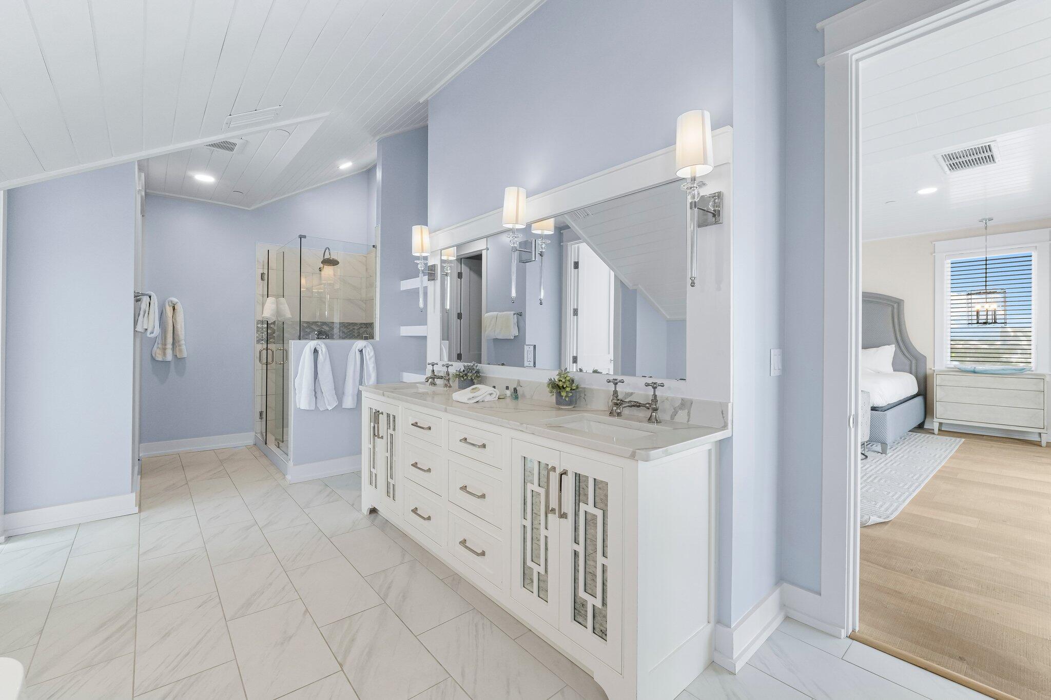 22015 Front Beach Road Panama City Beach, FL 32413 - Photo 63 of 104 a bathroom with a double vanity sink mirror and shower