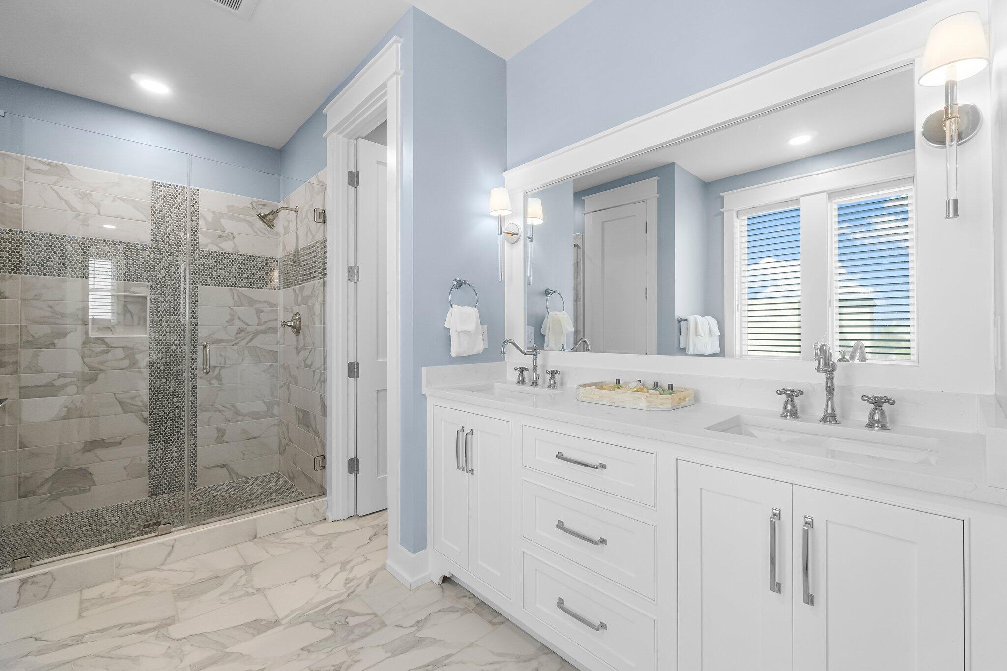 22015 Front Beach Road Panama City Beach, FL 32413 - Photo 77 of 104 a bathroom with a double vanity sink mirror and shower