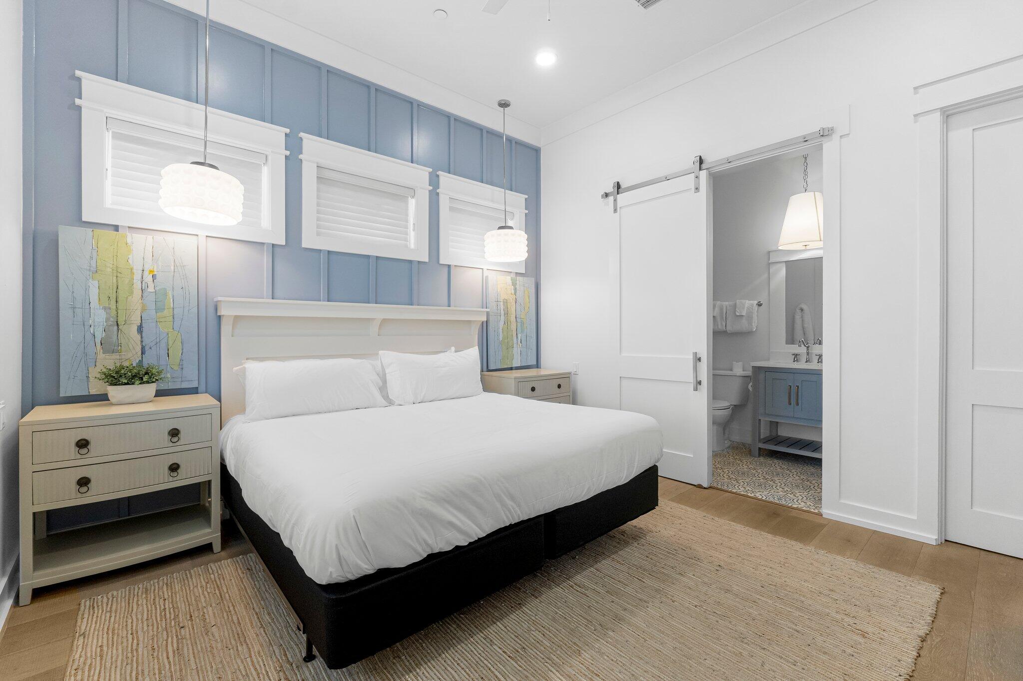 22015 Front Beach Road Panama City Beach, FL 32413 - Photo 82 of 104 a bedroom with a bed and a window