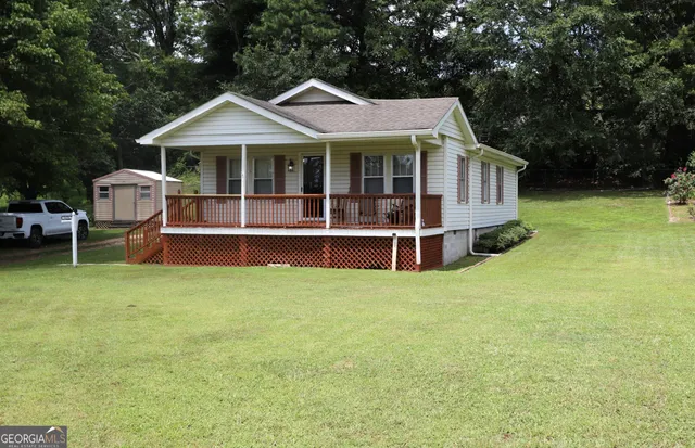 a house with garden in front of it