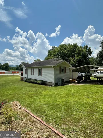 a house view with a garden space