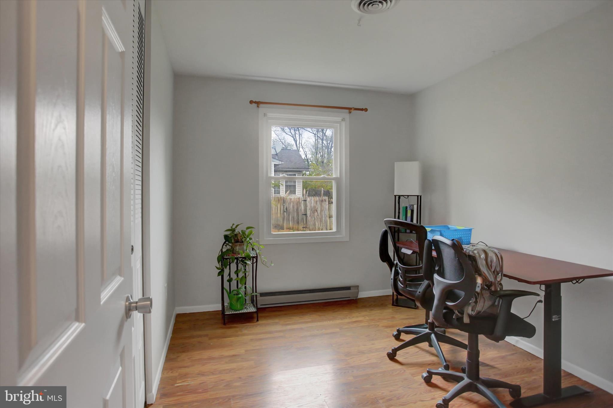 501 Cornell Avenue Hagerstown, MD 21742 - Photo 13 of 28 a view of a workspace with furniture and a window