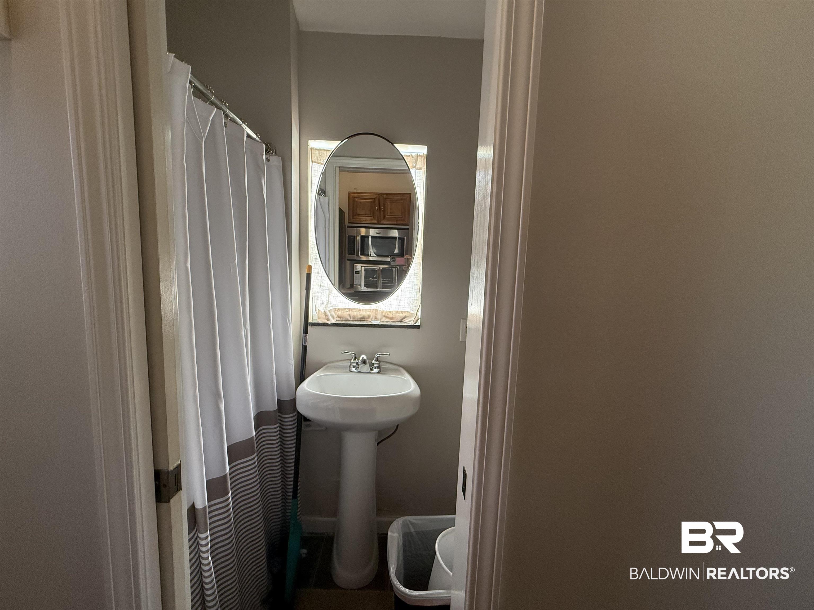 28114 Preserve Trail, Unit 190 Elberta, AL 36530 - Photo 31 of 69 Full bath featuring a shower with shower curtain